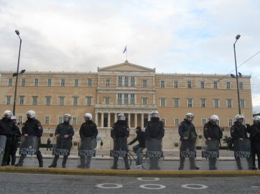 Police, not politicians outside the Greek parliament, Athens